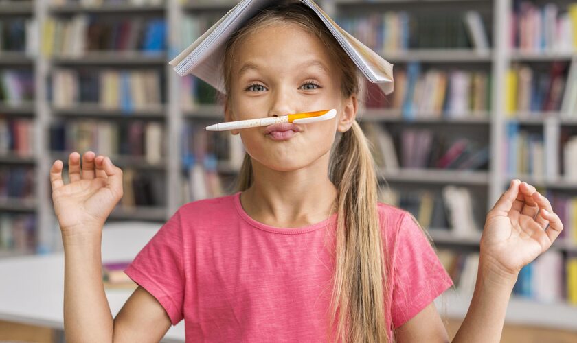 front-view-girl-being-silly-library